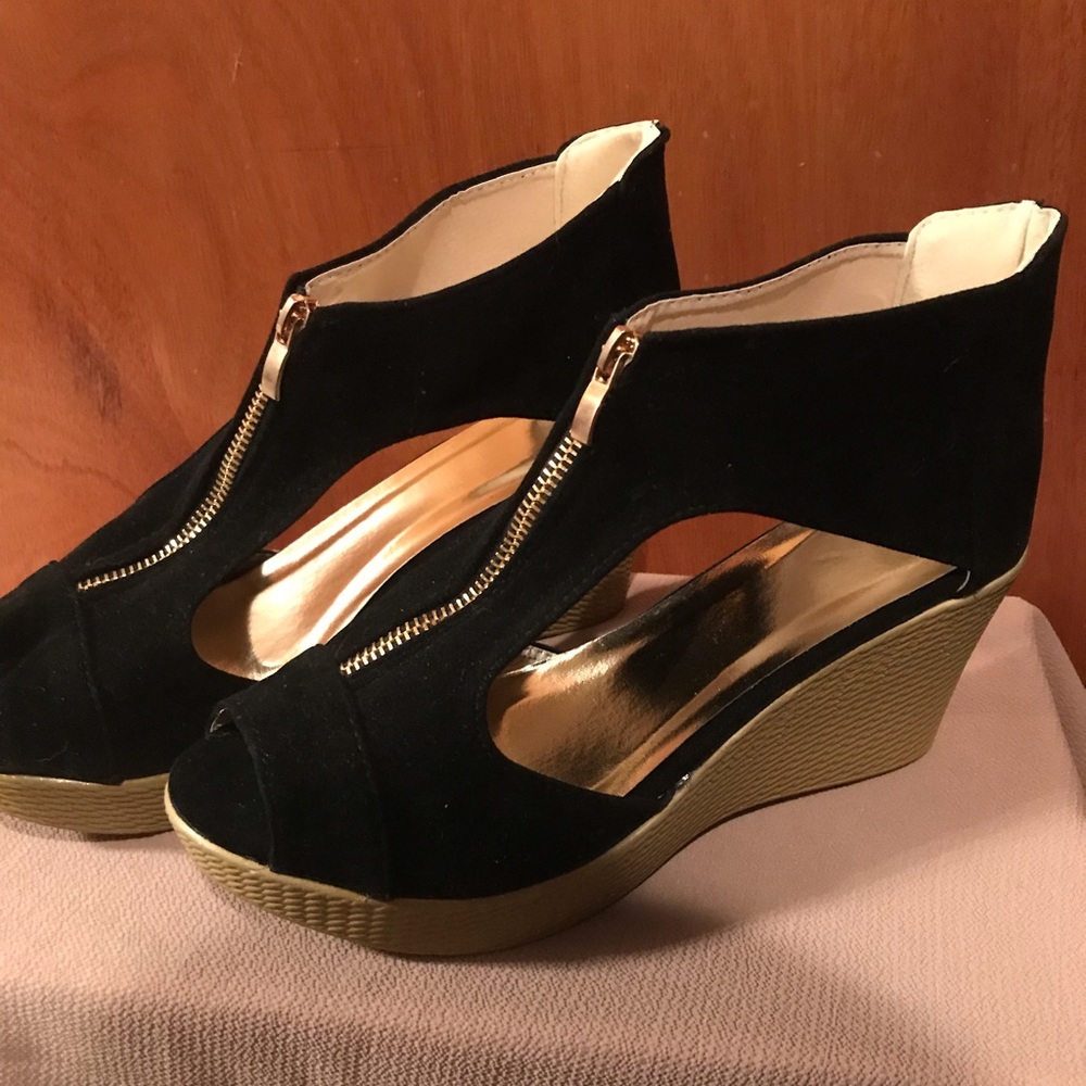 Zip up black wedge heels